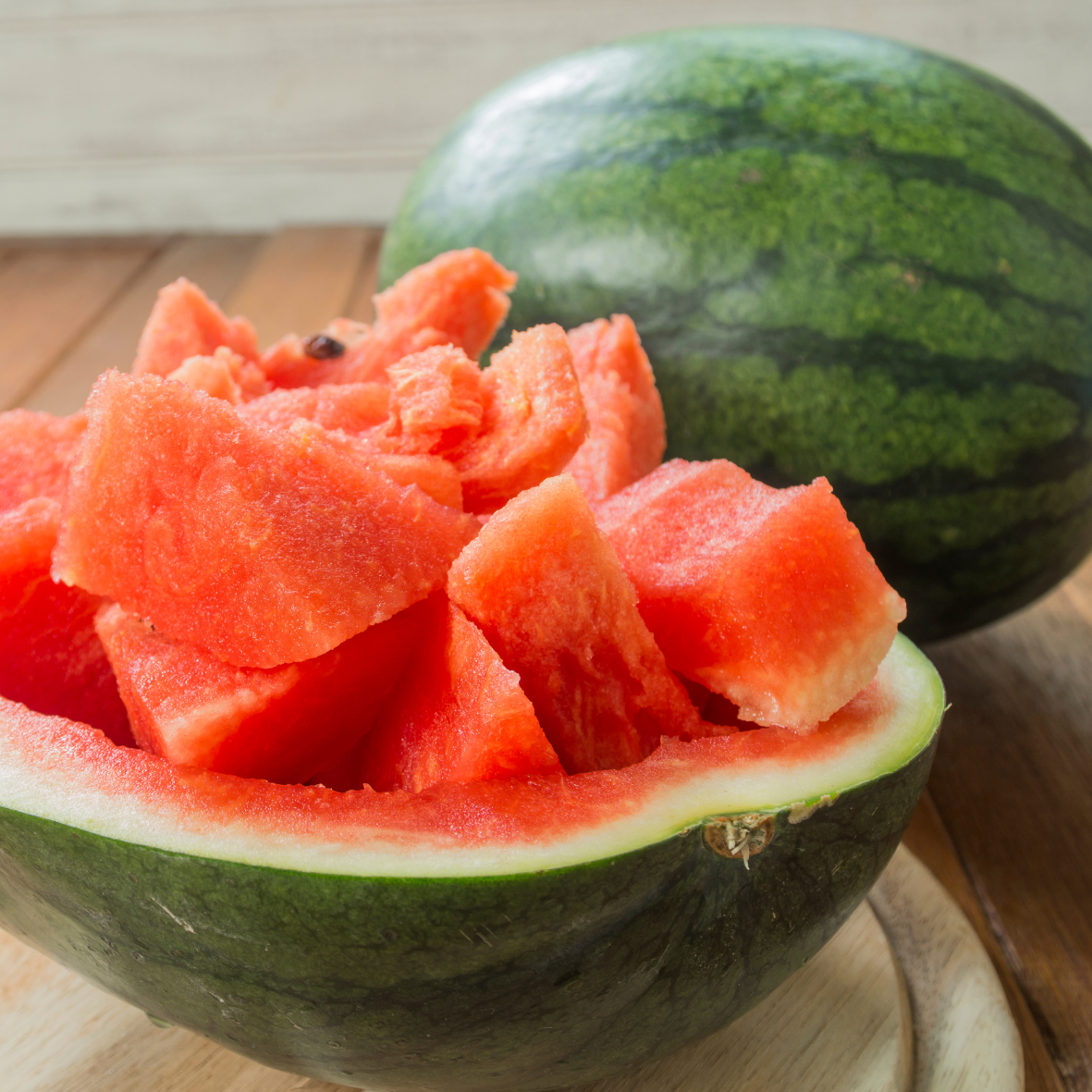 Half a watermelon with watermelon squares cut and placed in center AlpacaSoaps Alpaca Soaps